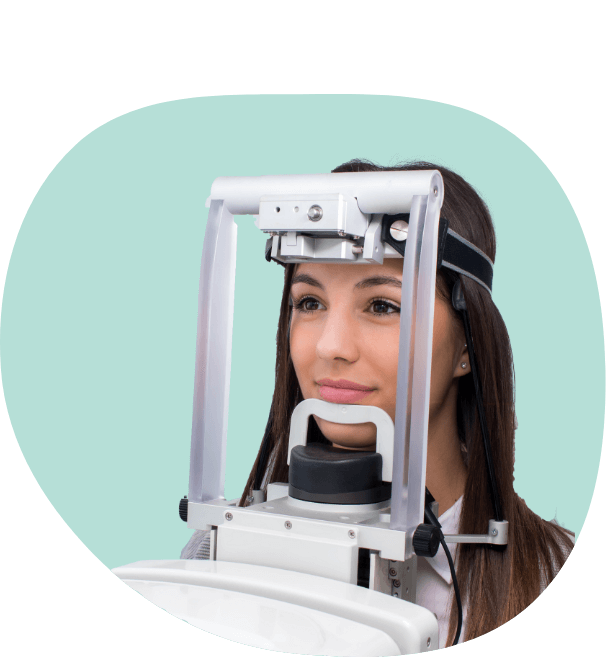 Young woman getting a dental scan taken of her mouth and jaw