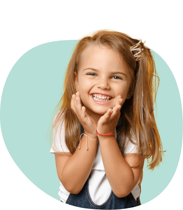 Girl with long brown hair smiling after visiting childrens dentist in South Portland and Auburn