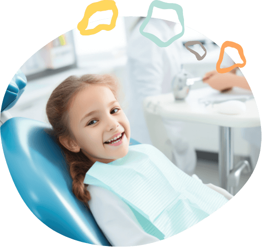 Young girl grinning in dental chair