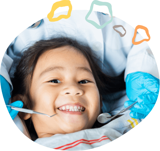 Young girl smiling during dental checkup